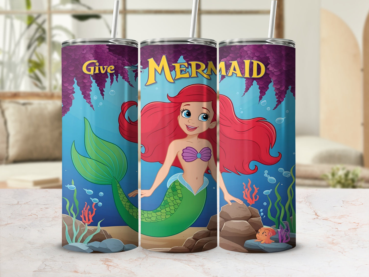 Ariel the mermaid with red hair and a green tail, under the sea.
