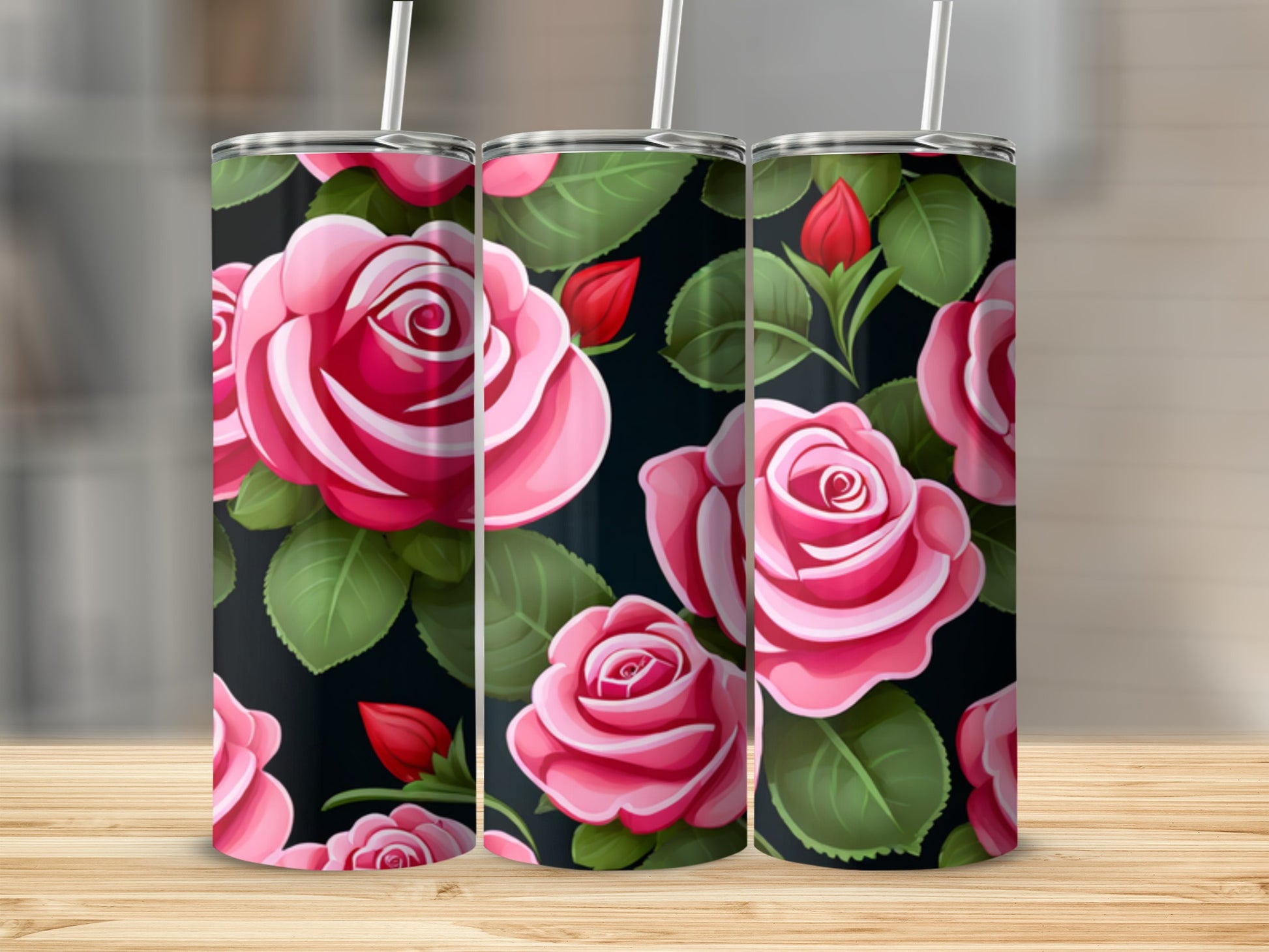 Three tumblers with pink roses and green leaves on a black background.