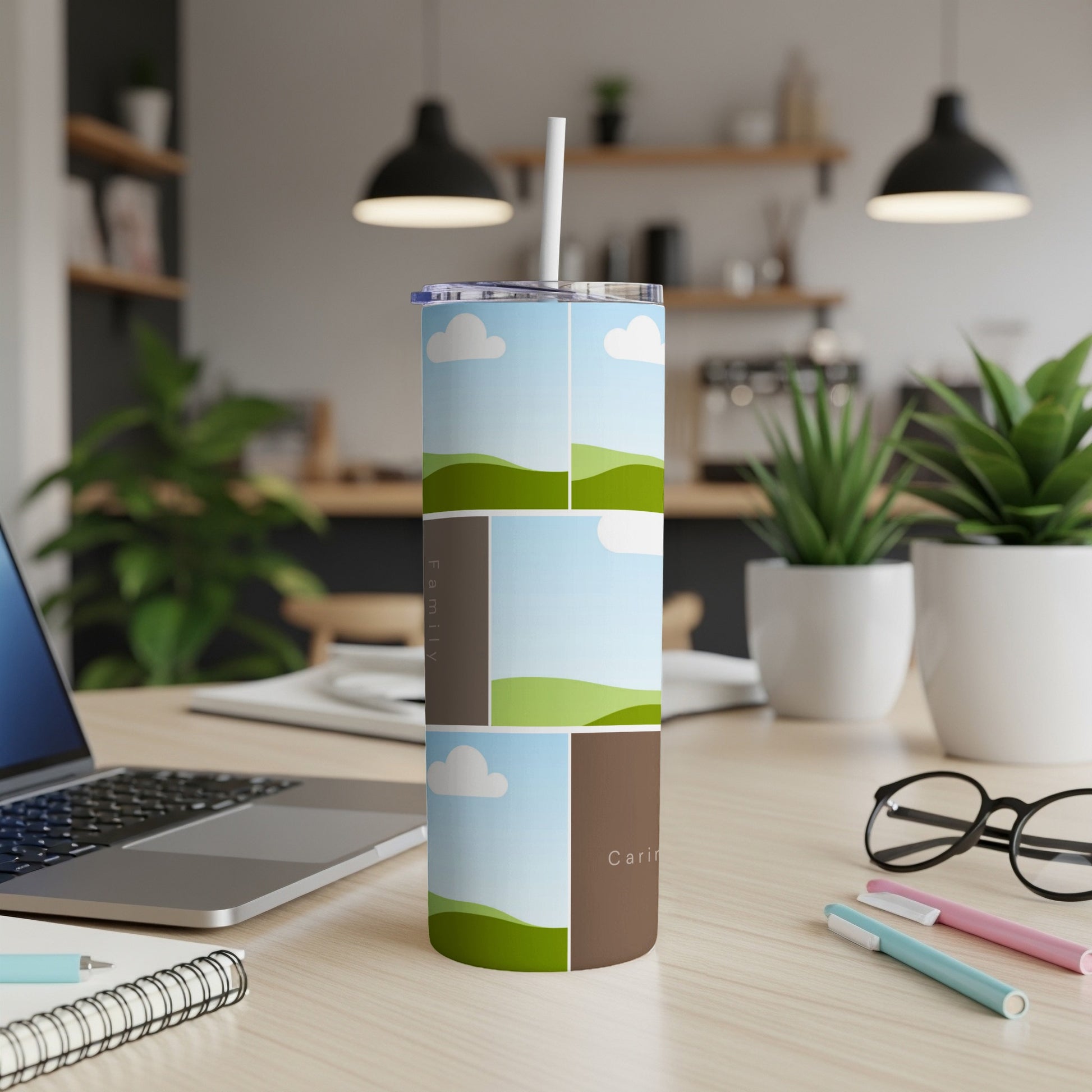 Tumbler with pastel sky, clouds, and green hills collage, featuring "Family" and "Caring".
