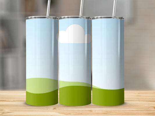 Three cylindrical tumblers with a green hilly landscape and cloudy blue sky design.