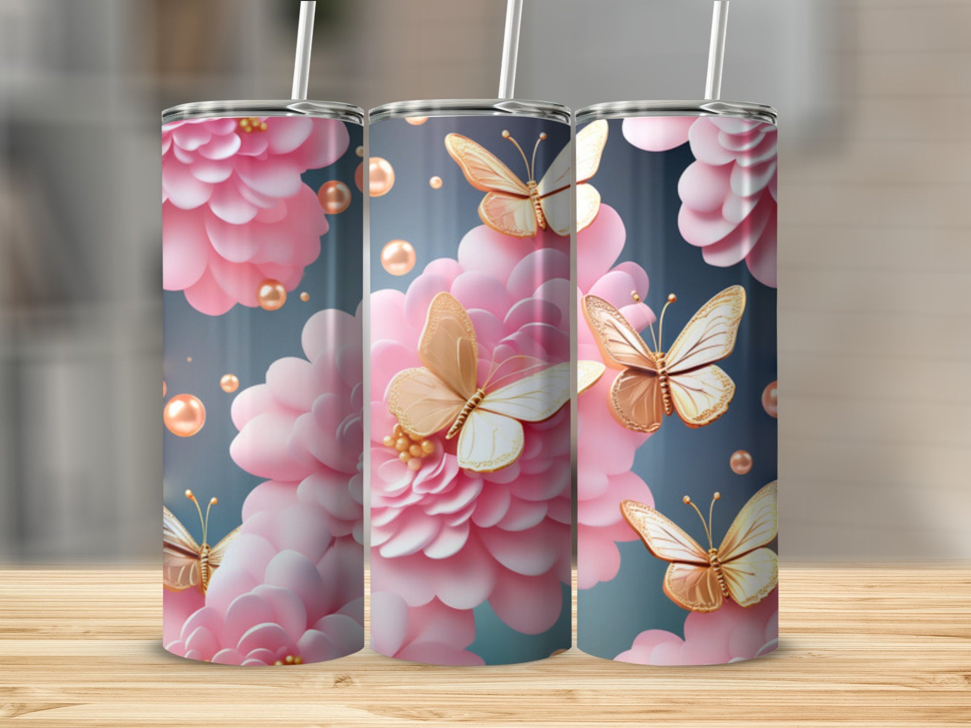 Pink floral pattern with gold butterflies on three tumblers.
