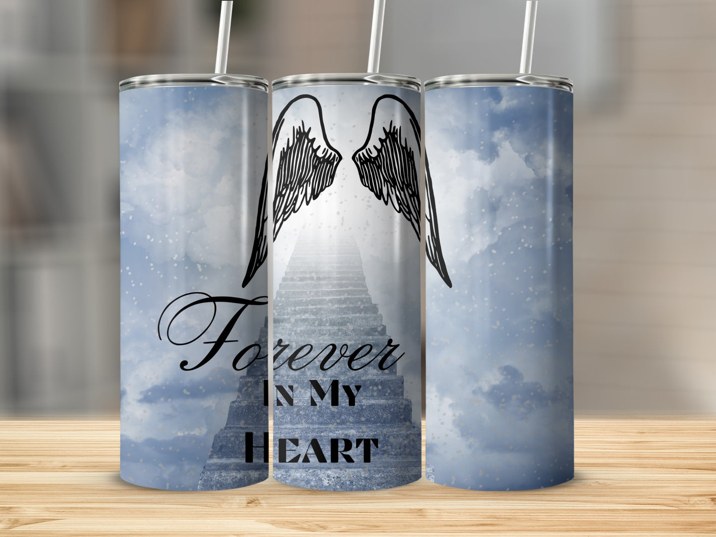 Tumbler with angel wings and "Forever in my Heart" text on starry sky background.