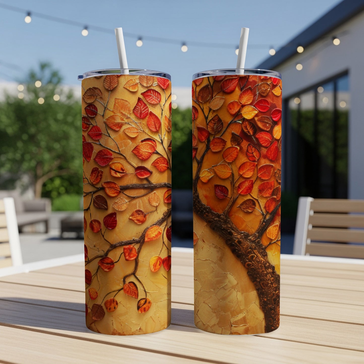 Two tumblers with a textured tree art design in autumnal colors.