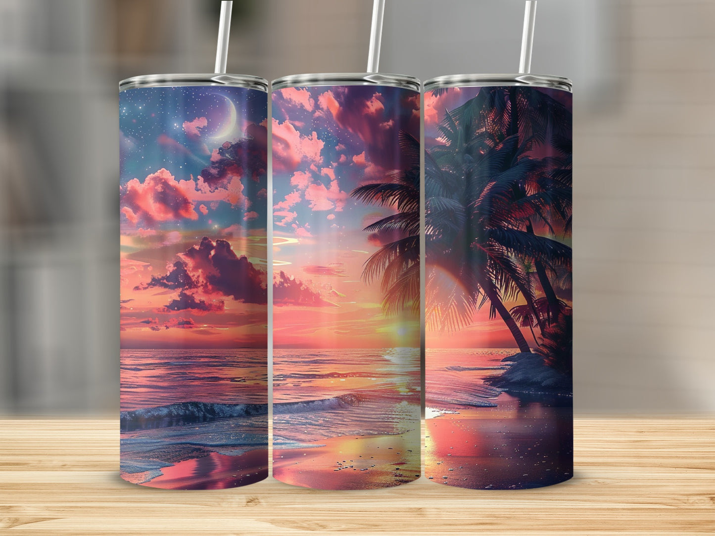 Three tumblers with a sunset beach scene and palm trees.