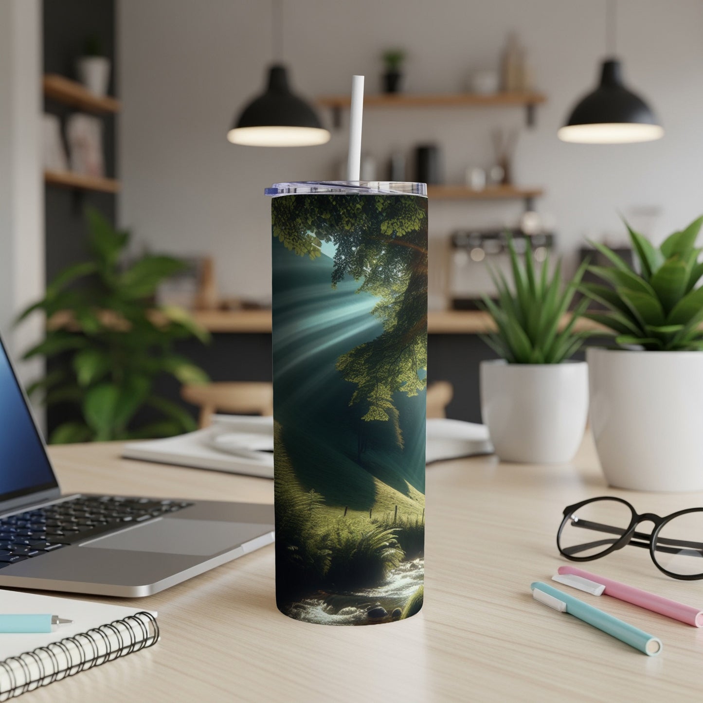 Green forest scene with sunbeams shining through trees, on a tumbler.