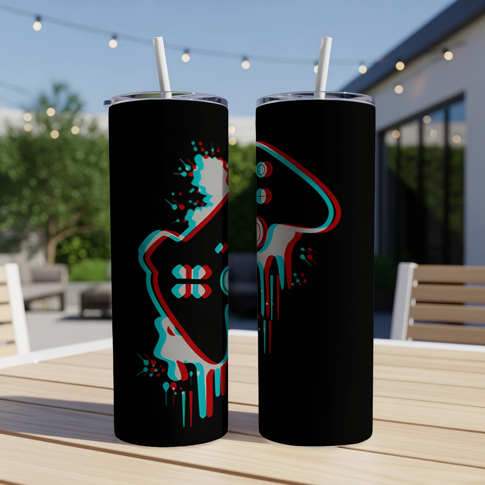 Two black tumblers with a glitch art video game controller design.