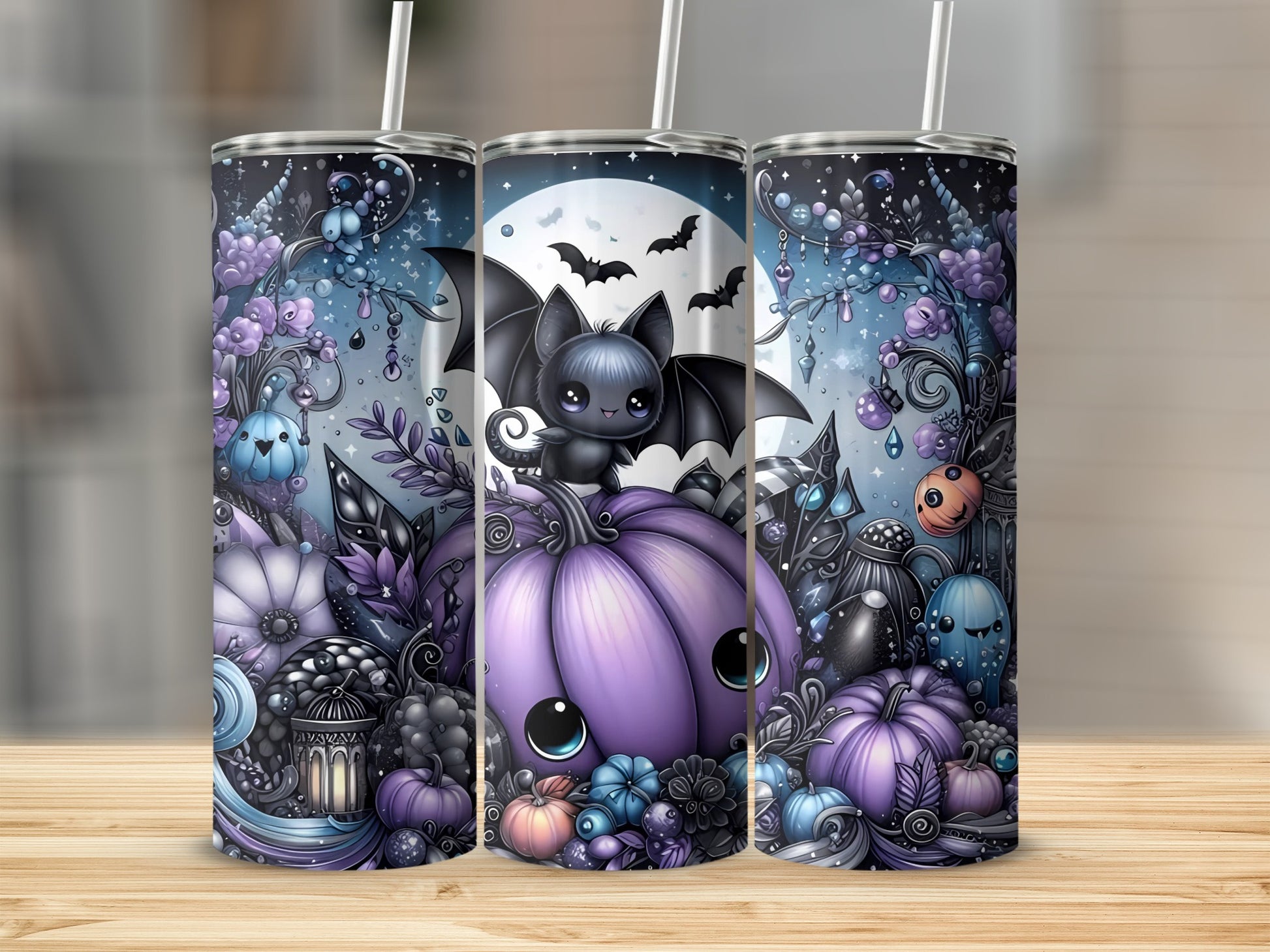 Three tumblers with a Halloween design featuring a cute bat and purple pumpkins.