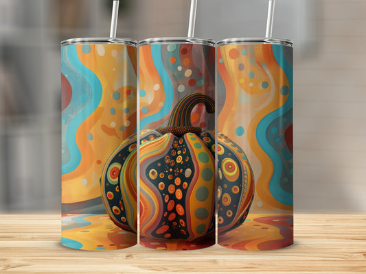 Tumbler with a colorful, abstract pumpkin design and wavy background.