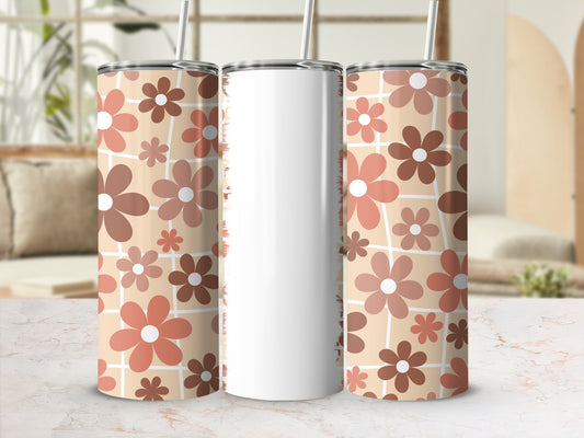 Two tumblers with a retro floral pattern, one blank.