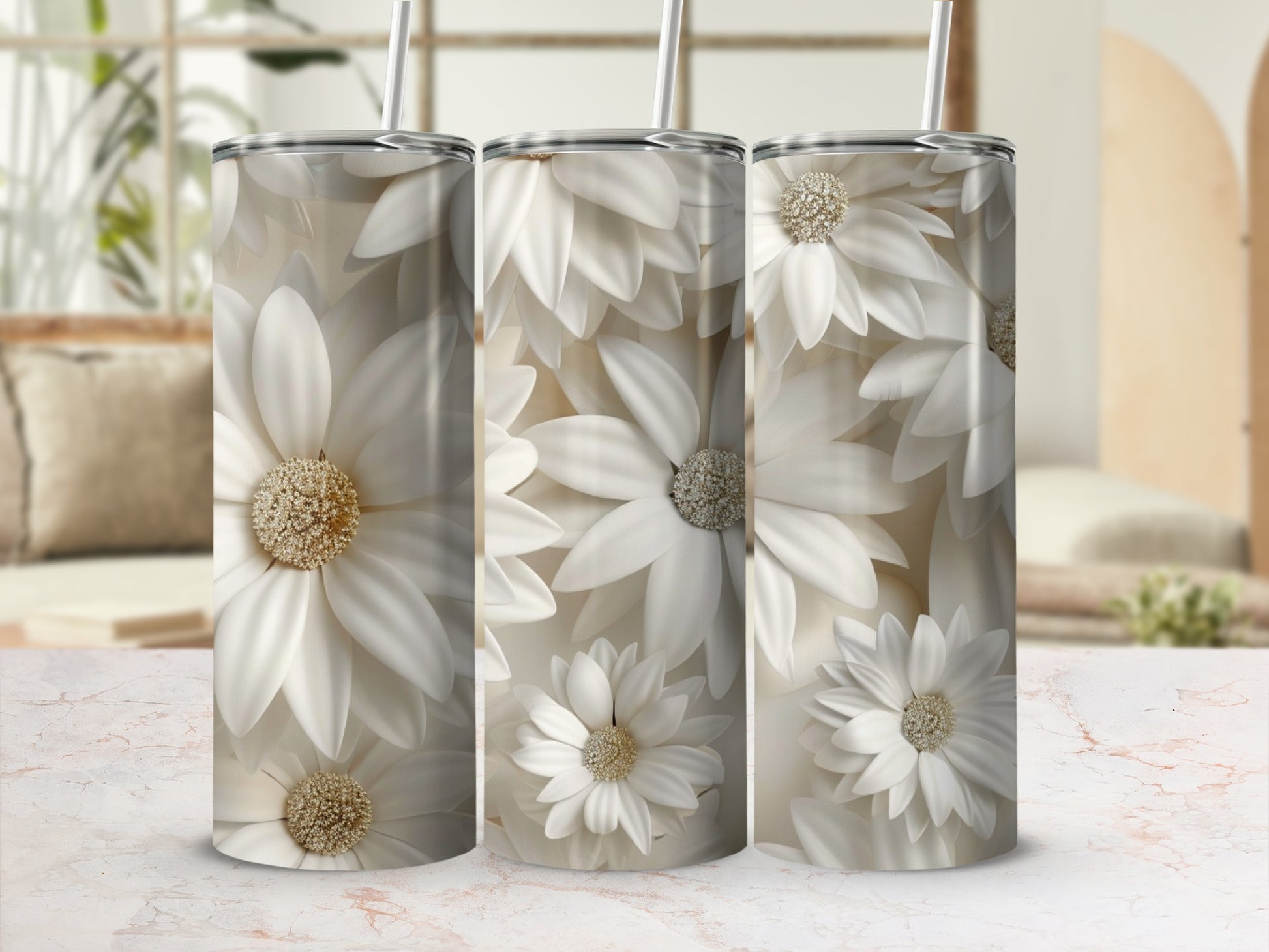 Three white daisy tumblers with flower pattern against a blurred background.