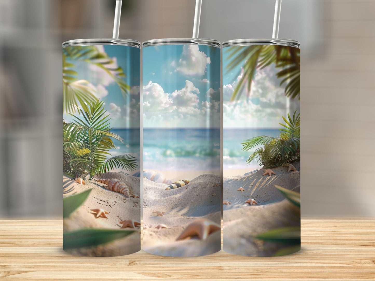 Three tumblers with a tropical beach scene featuring shells and palm trees.