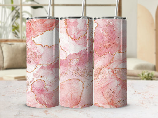 Pink marble tumbler with gold accents and straw.