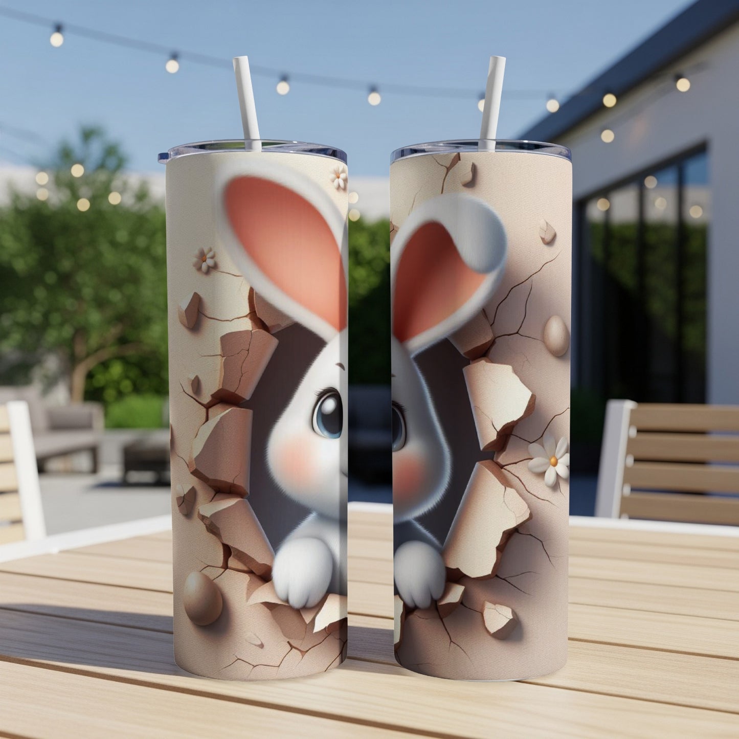 Two tumblers with a cartoon bunny breaking through a textured surface.