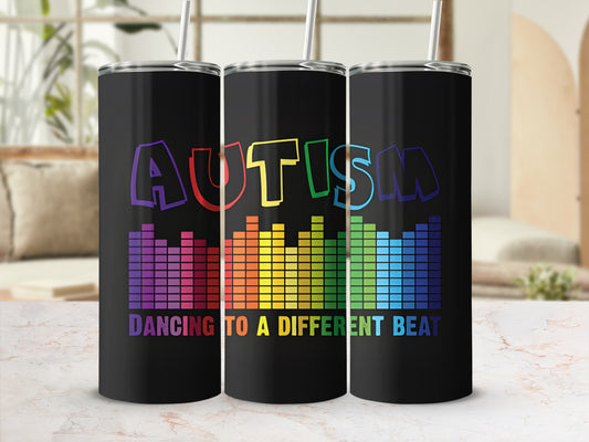 Black tumbler with "Autism Dancing to a Different Beat" in colorful equalizer design.