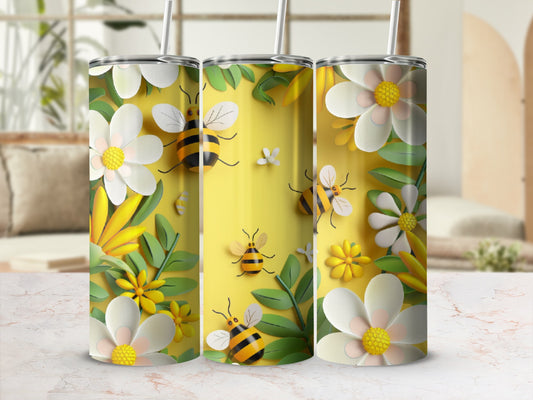 Three tumblers with bees and white flowers against a yellow background.