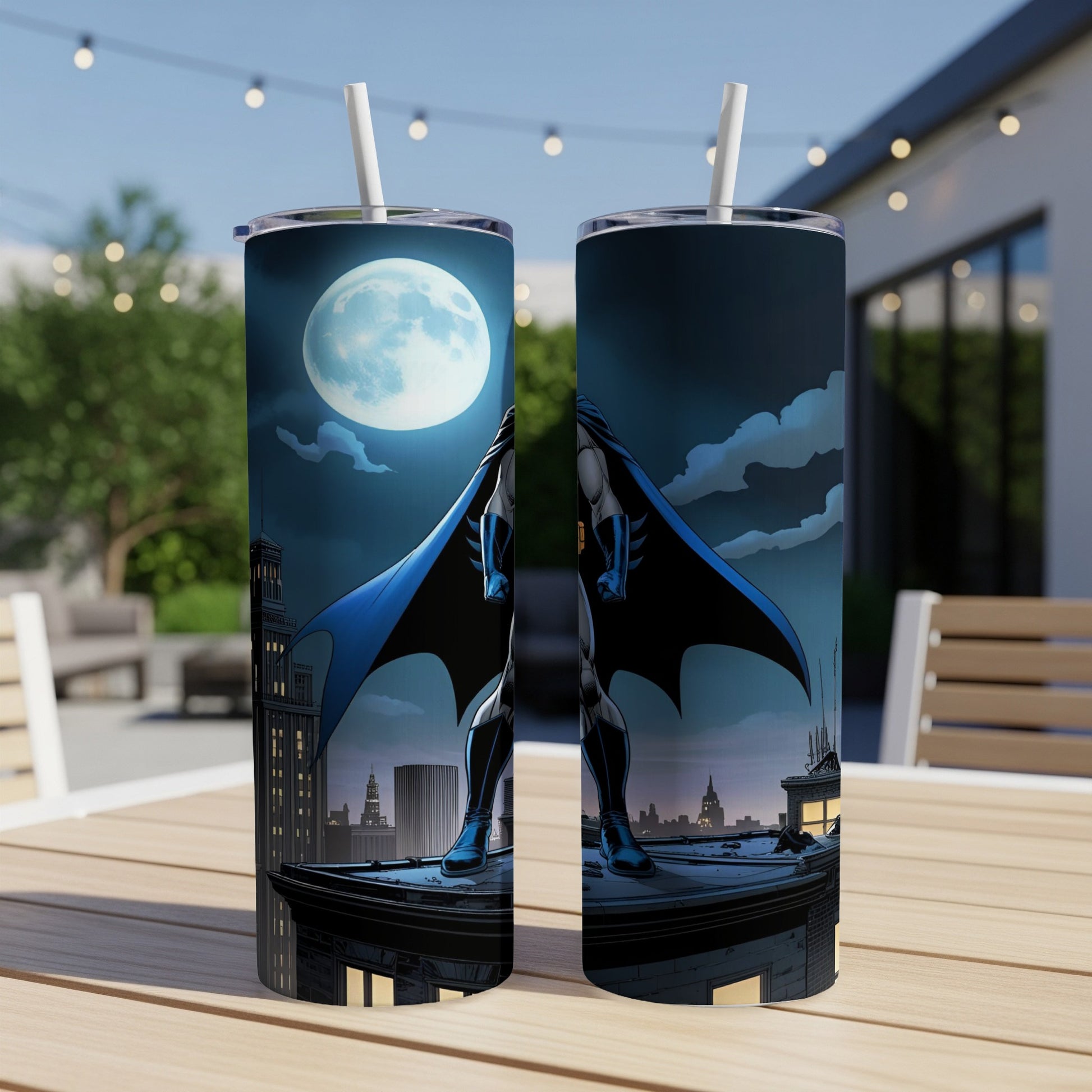 Batman standing on a rooftop at night with a full moon behind him.