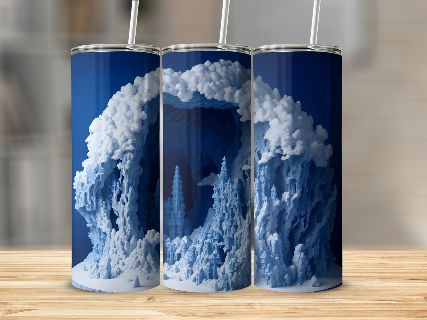 Blue and white snowy castle scene on a tumbler with a straw.