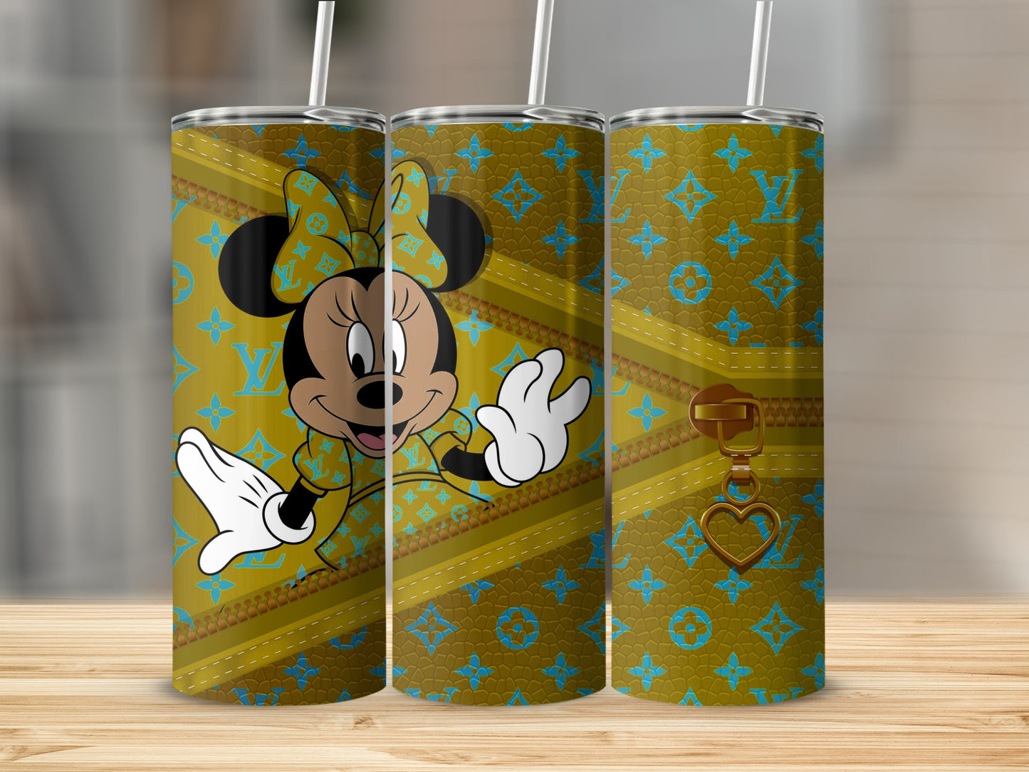 Minnie Mouse in designer print tumbler with zipper and heart charm.