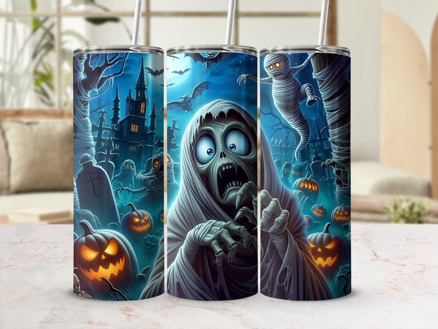 Halloween tumblers with ghosts, mummies, bats, pumpkins, and a haunted castle.
