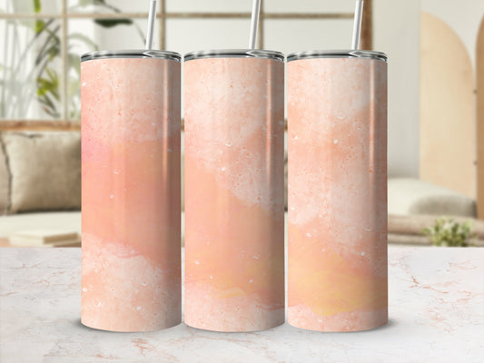 Three tall tumblers with a marbled pink and orange design.