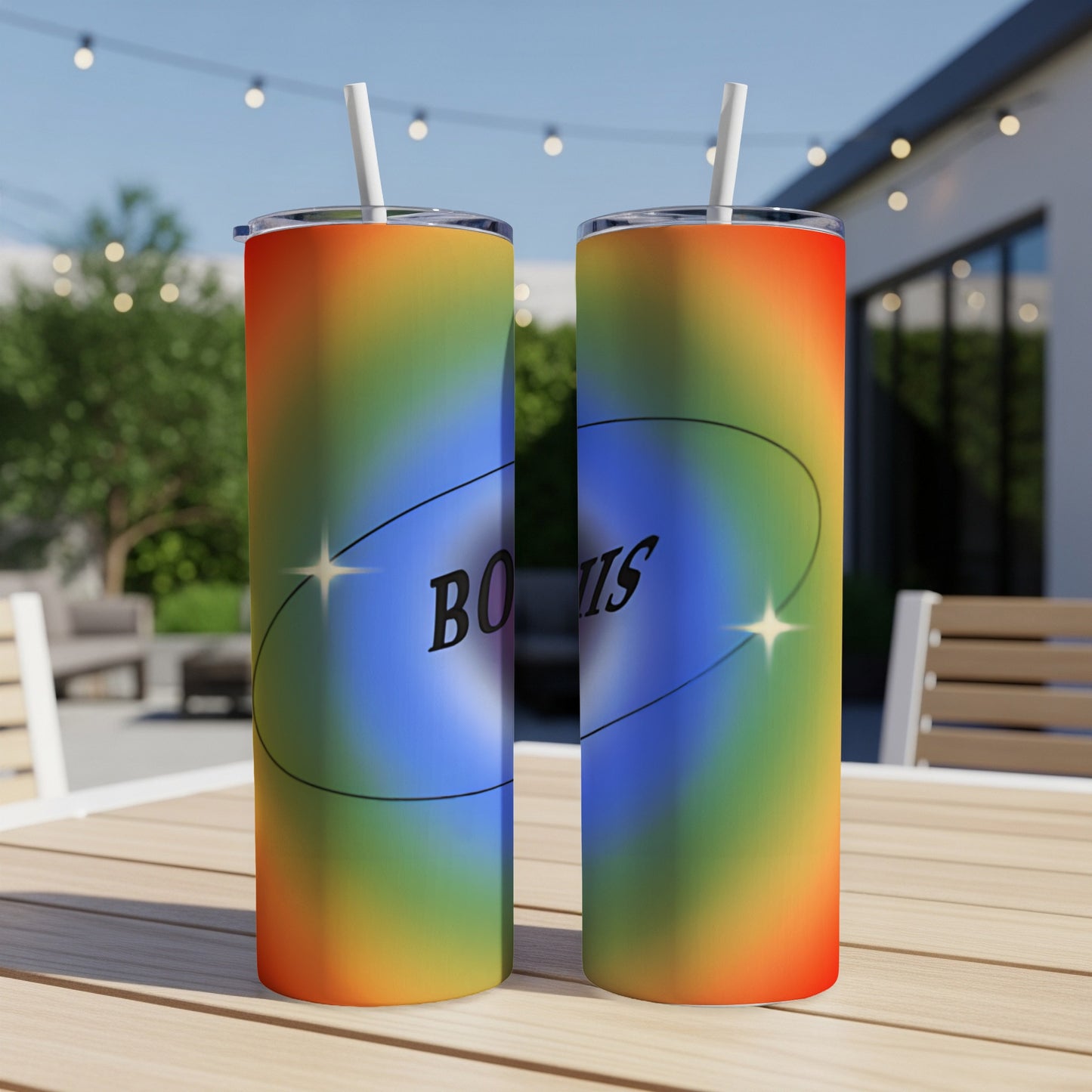 Two tall tumblers with rainbow gradient and "BOOIS" text on a table.