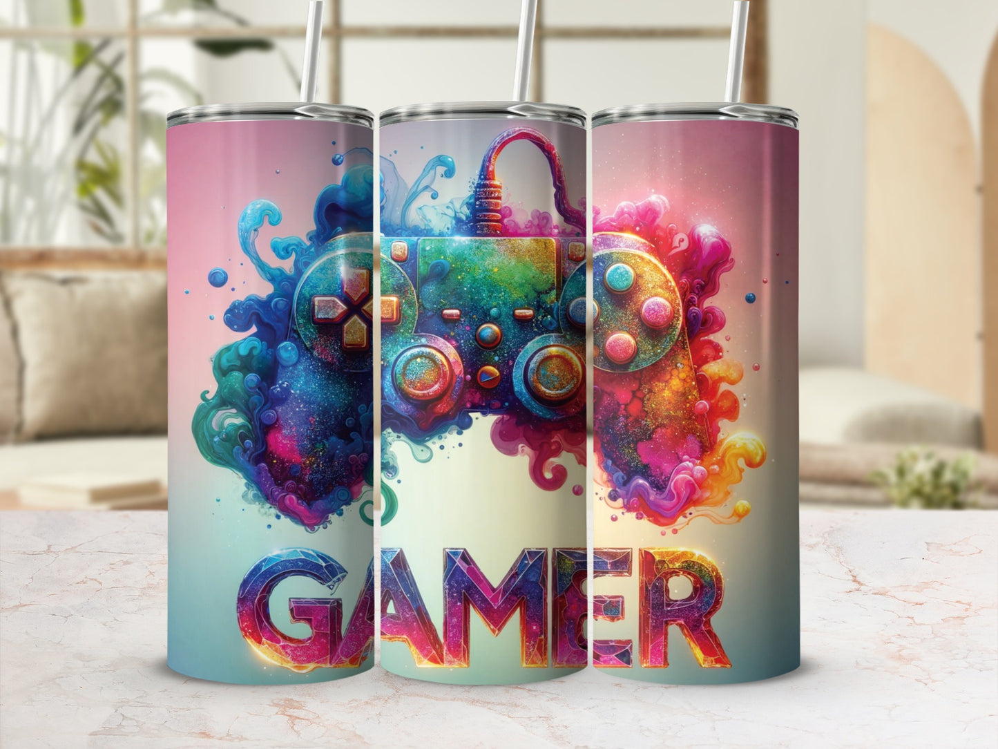 Trio of tumblers with colorful video game controller and "GAMER" text.