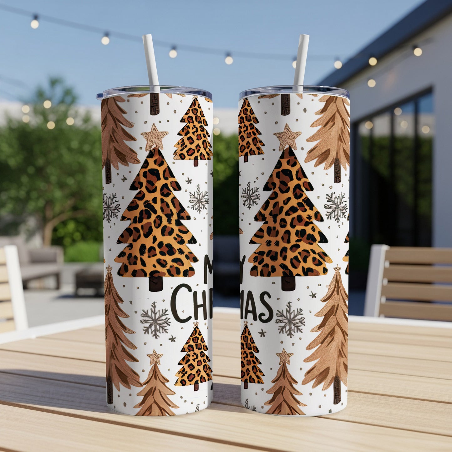 Two tumblers with leopard print and snowflake Christmas trees.