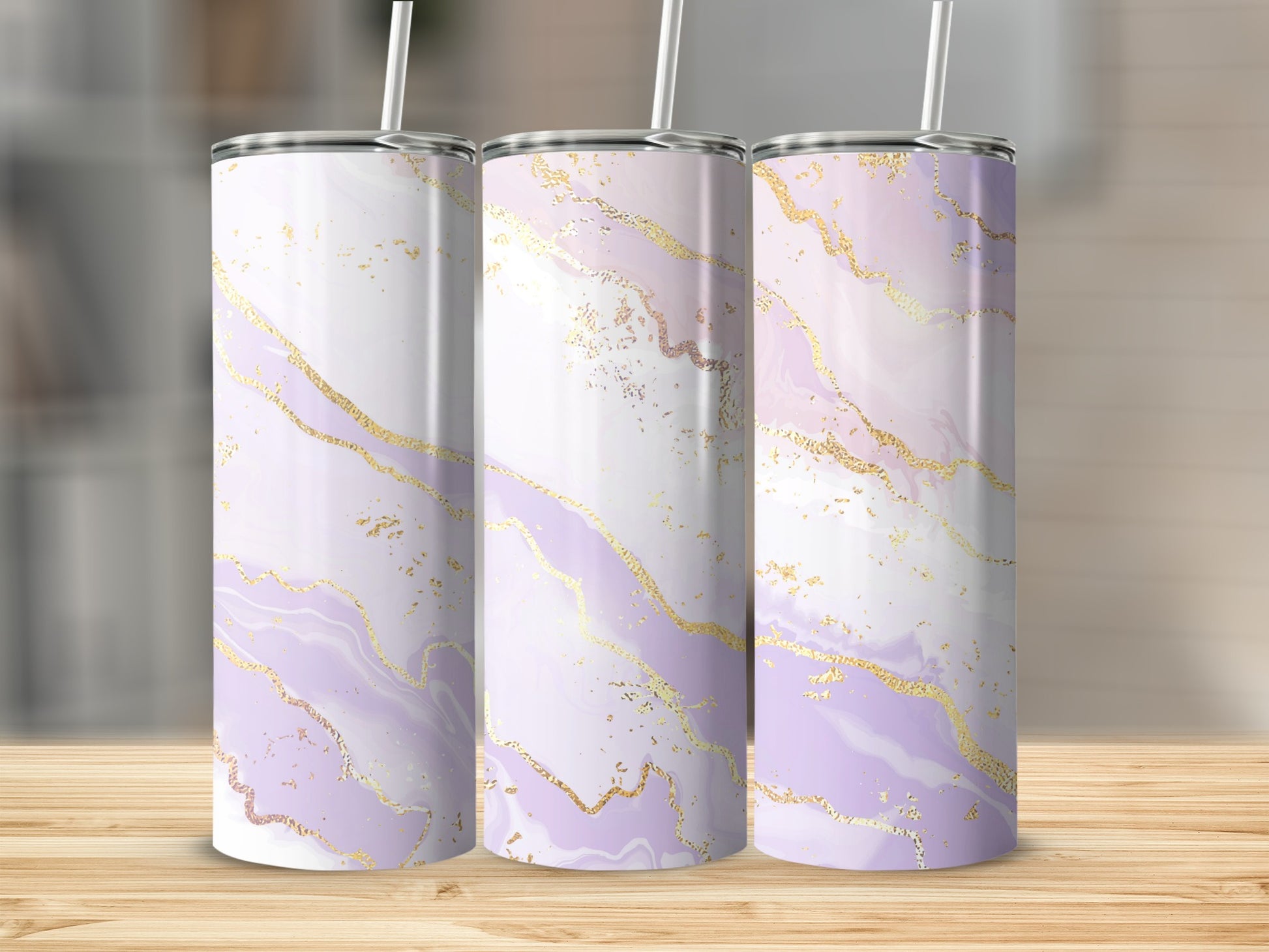 Three tall tumblers with a purple and gold marble pattern.