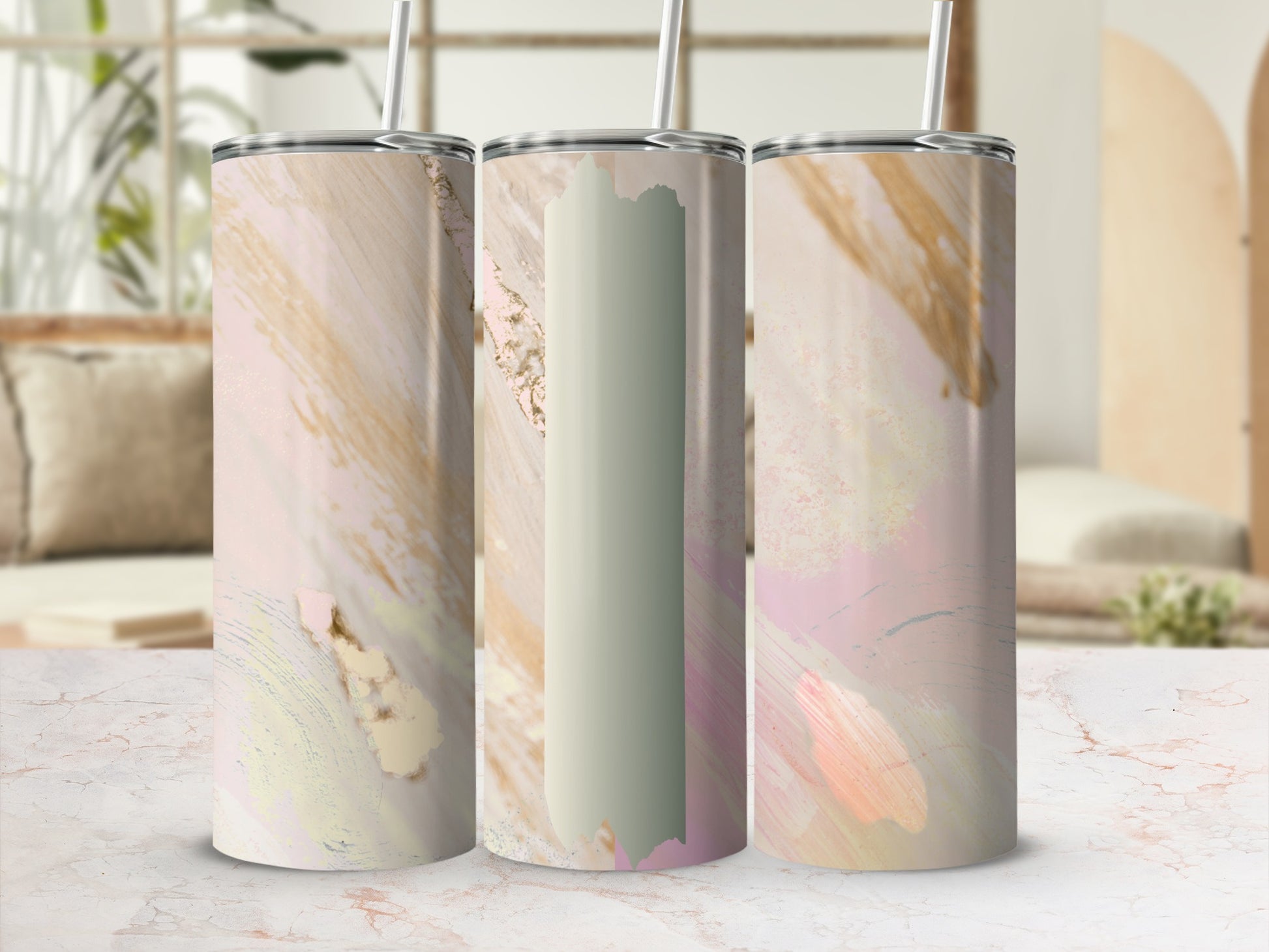 Three tumblers with a pastel abstract paint splatter design.