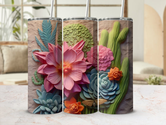 Three tumblers with embossed floral and cactus designs and a marble background.