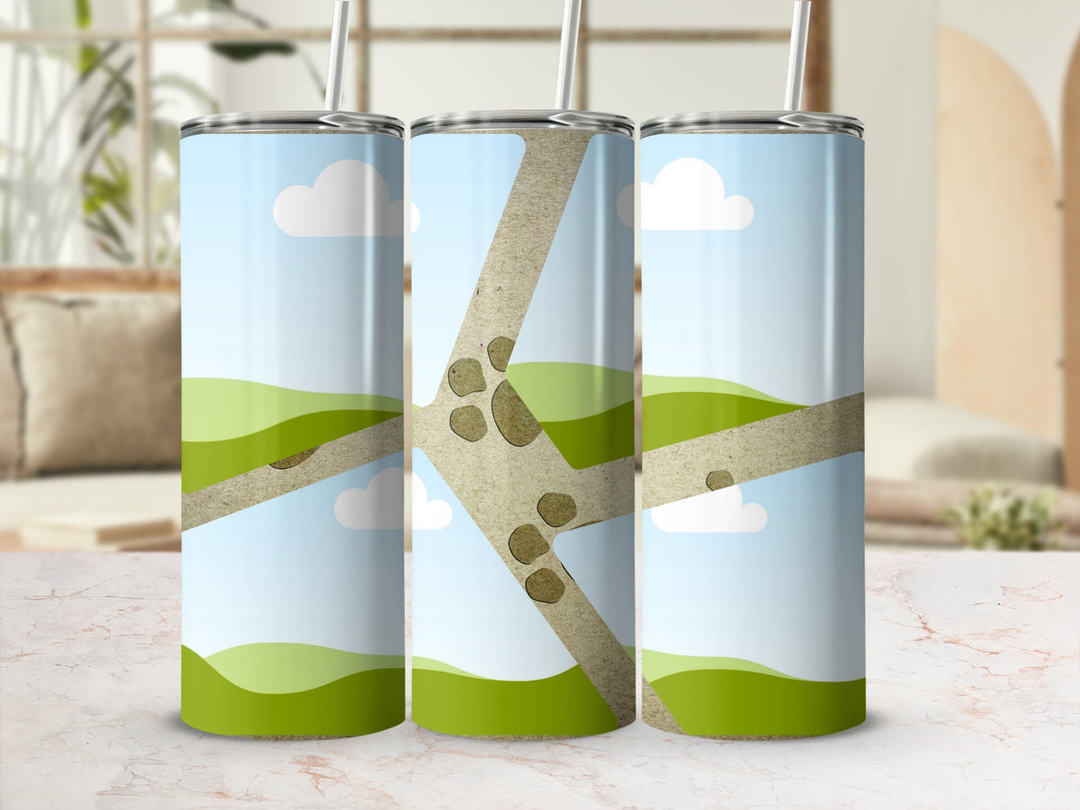 Three tumblers with a landscape design and stone pathway.