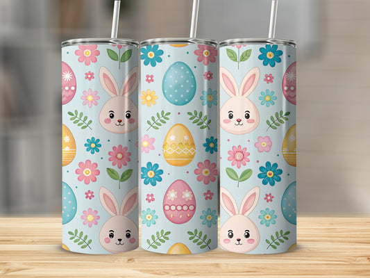Three pastel bunny and Easter egg patterned tumblers with straws.