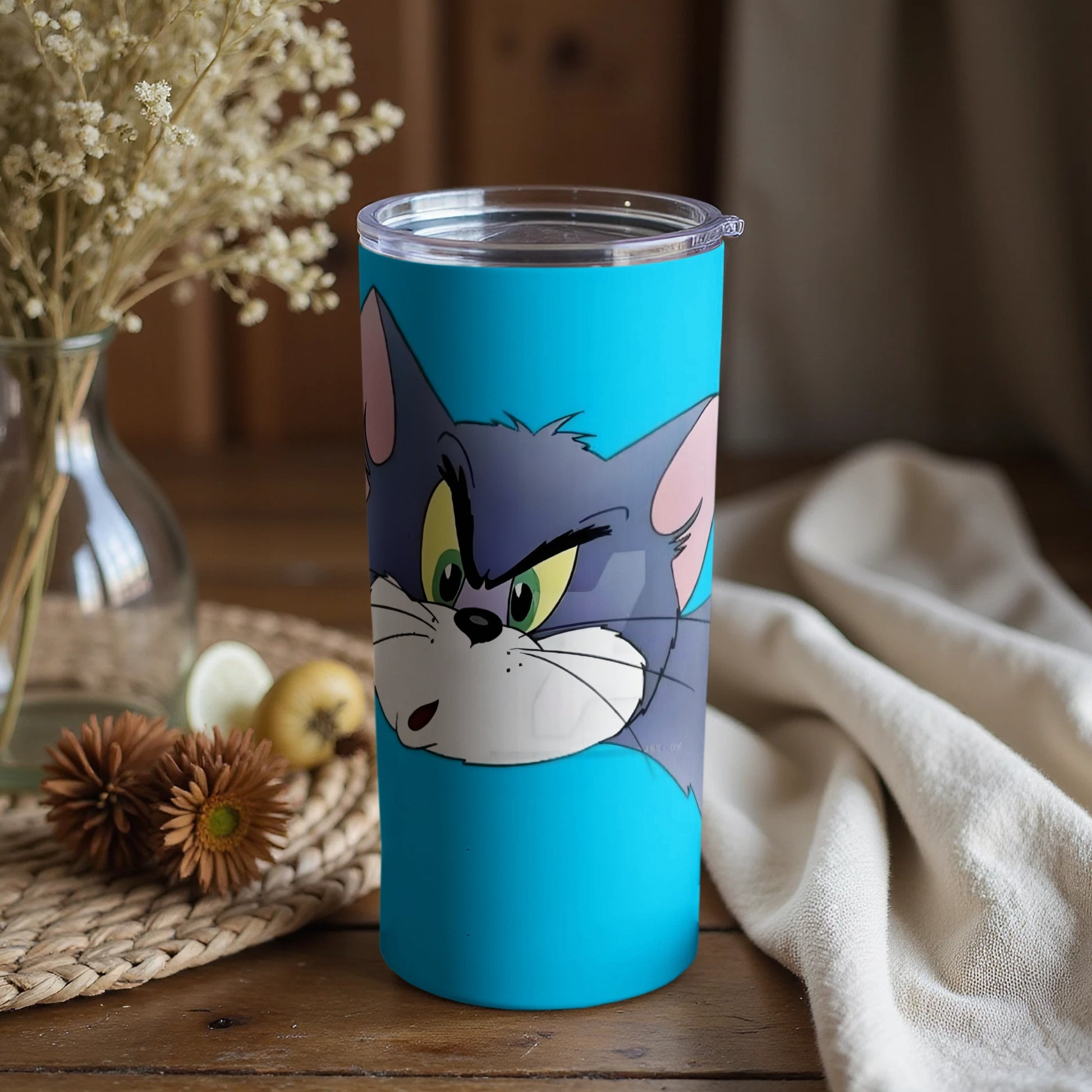 Animated Cat Face Design on Blue Travel Tumbler