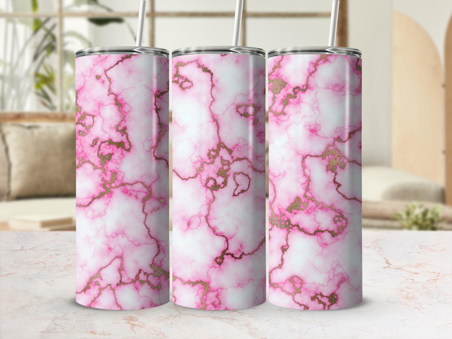 Marble tumbler with pink swirls and gold accents.