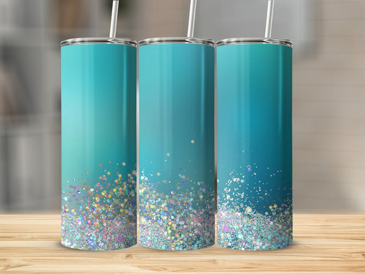 Three tumblers with teal gradient and iridescent glitter bottoms stand on a wooden surface.