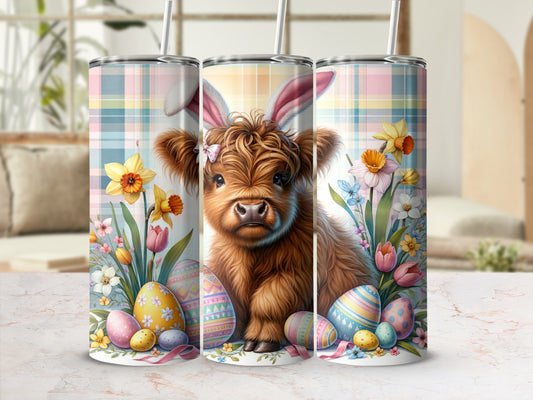 Fluffy highland cow with bunny ears and Easter eggs.