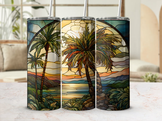 Three stained glass tumblers featuring a tropical sunset scene with palm trees.