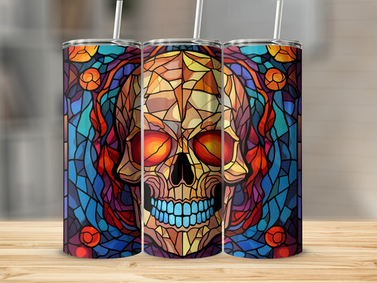 Stained glass skull tumbler with colorful, geometric patterns.