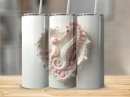 White tumblers featuring a heart-shaped design with pink seahorses and hearts.