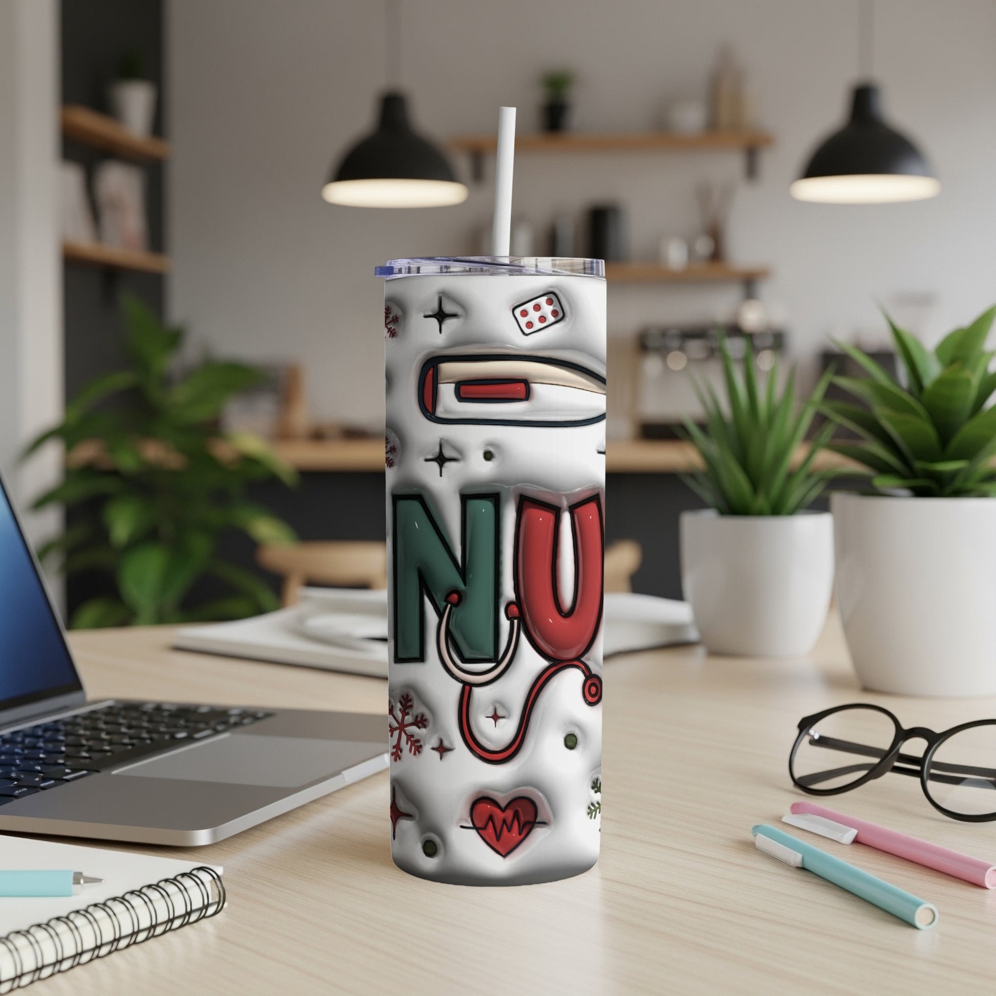 White tumbler with "NU" in green and red, decorated with medical icons.