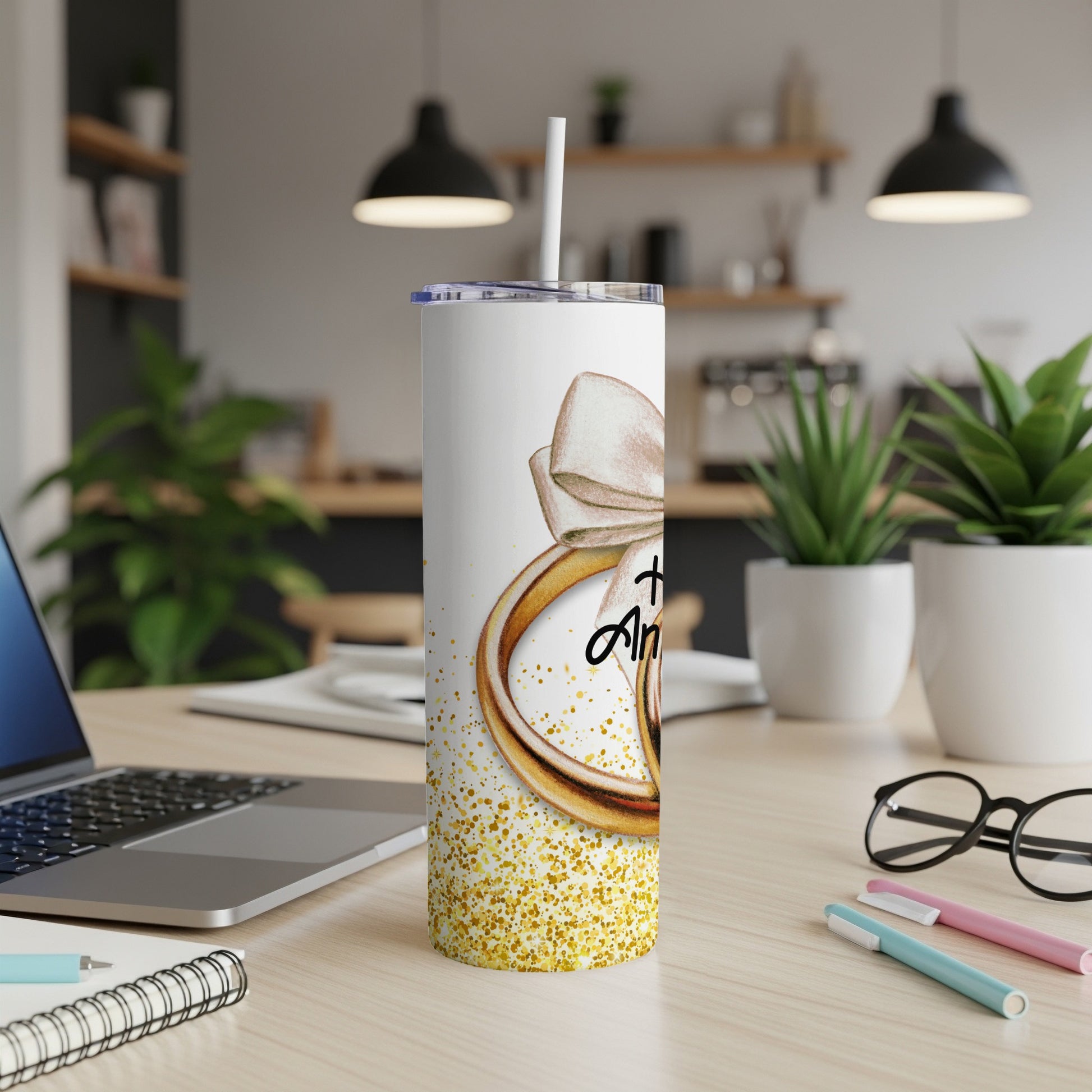 White tumbler with gold glitter and rings, "I Do" text, and bow.
