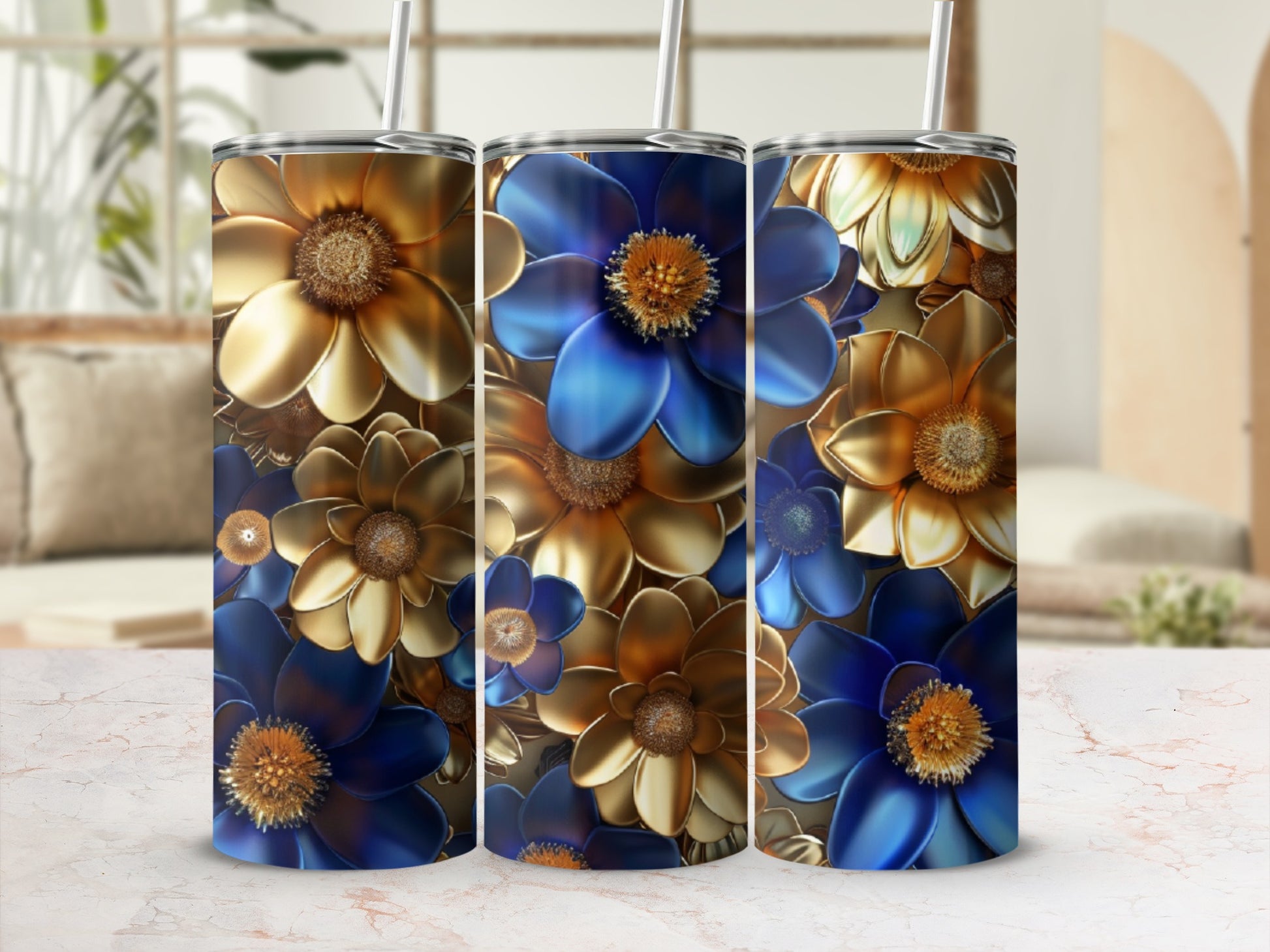 Three tumblers featuring ornate blue and gold floral designs.