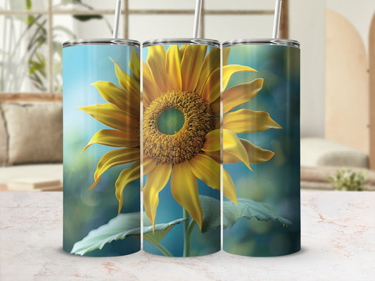 Tall tumbler with a large, detailed sunflower design and soft bokeh background.