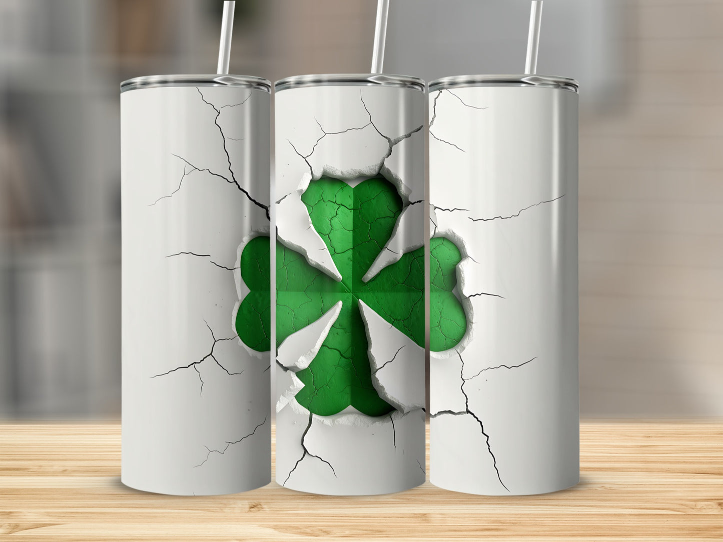 Cracked white tumbler with a green shamrock design.