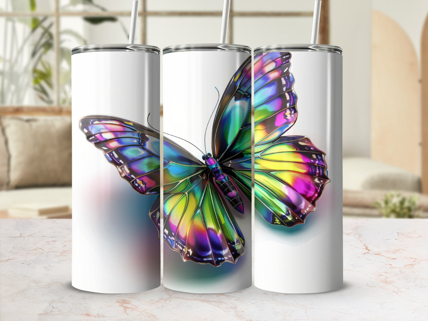 Three tumblers showcasing a vibrant, iridescent butterfly design.