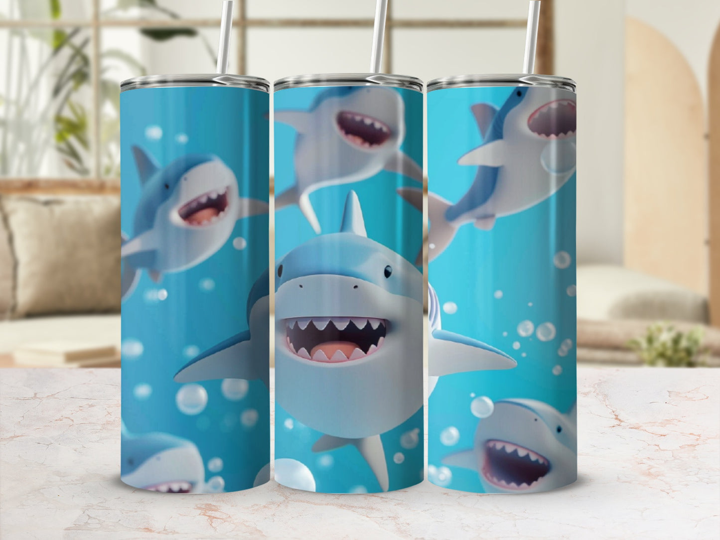 Three tumblers featuring cartoon sharks swimming with bubbles and bokeh background.