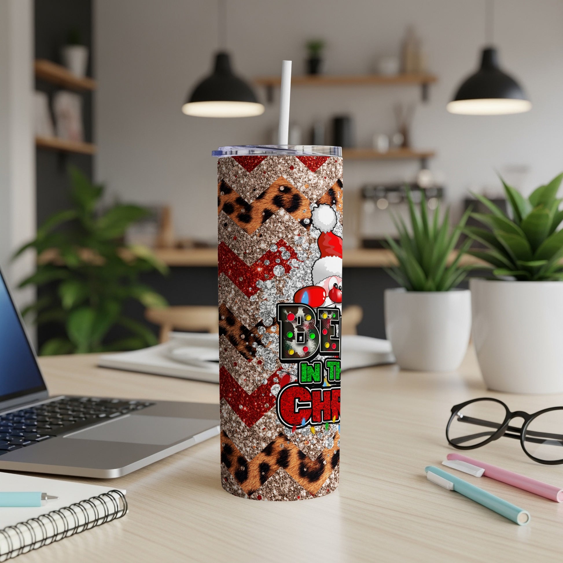 Glittery cheetah print tumbler with red glitter Christmas design.