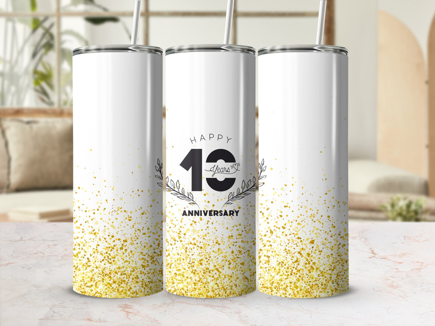 White tumbler with "Happy 10 Years Anniversary" and gold glitter.