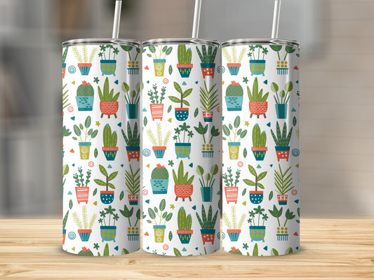 Three tumblers adorned with a pattern of colorful potted plants and graphic elements.