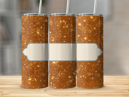 Three glitter tumblers with blank beige labels on a wooden surface.